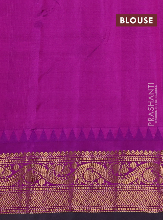 Pure gadwal silk saree dual shade of mustard and purple with floral zari woven buttas and temple design zari woven border