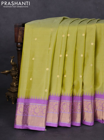 Pure gadwal silk saree lime green and lavender with zari woven buttas and temple design zari woven border