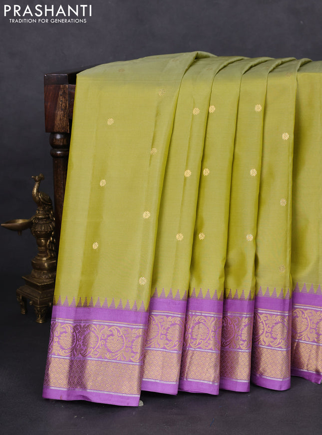 Pure gadwal silk saree lime green and lavender with zari woven buttas and temple design zari woven border