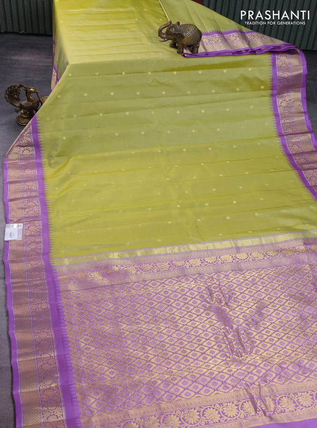 Pure gadwal silk saree lime green and lavender with zari woven buttas and temple design zari woven border