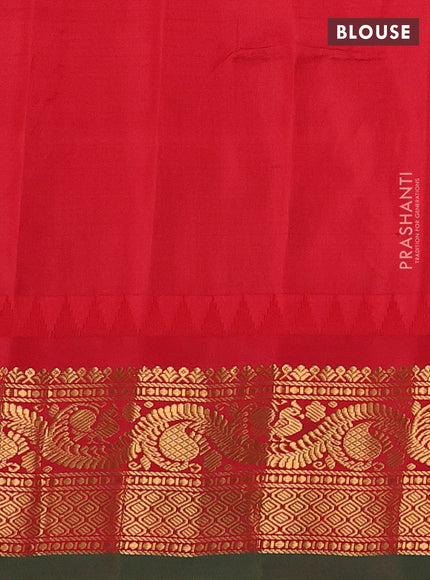 Pure gadwal silk saree dual shade of teal bluish green and red with floral zari woven buttas and temple design zari woven border