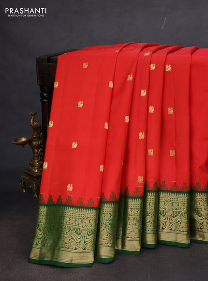 Pure gadwal silk saree orange and dark green with annam zari woven buttas and temple design zari woven border