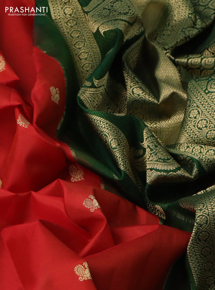 Pure gadwal silk saree orange and dark green with annam zari woven buttas and temple design zari woven border