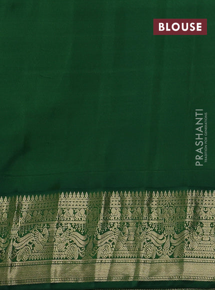 Pure gadwal silk saree orange and dark green with annam zari woven buttas and temple design zari woven border