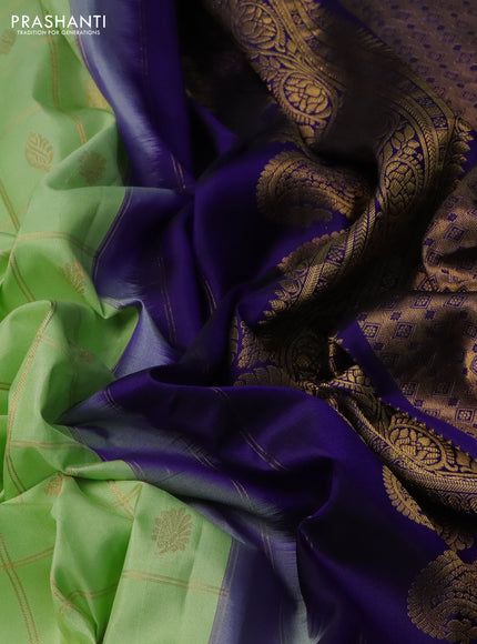 Pure gadwal silk saree pista green and blue with allover zari checks & buttas and temple design zari woven korvai border
