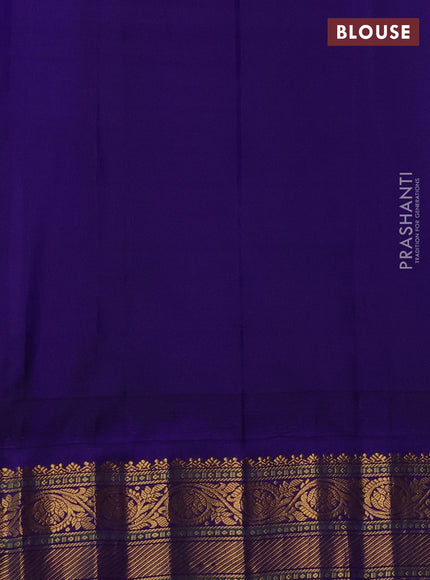 Pure gadwal silk saree pista green and blue with allover zari checks & buttas and temple design zari woven korvai border