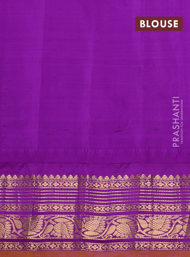 Pure gadwal silk saree dual shade of yellowish peach and purple with zari woven buttas and temple design zari woven border
