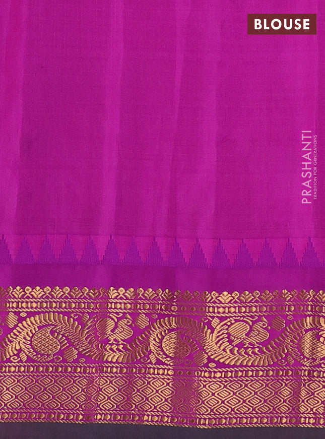 Pure gadwal silk saree green and purple with allover zari woven buttas and temple design zari woven border