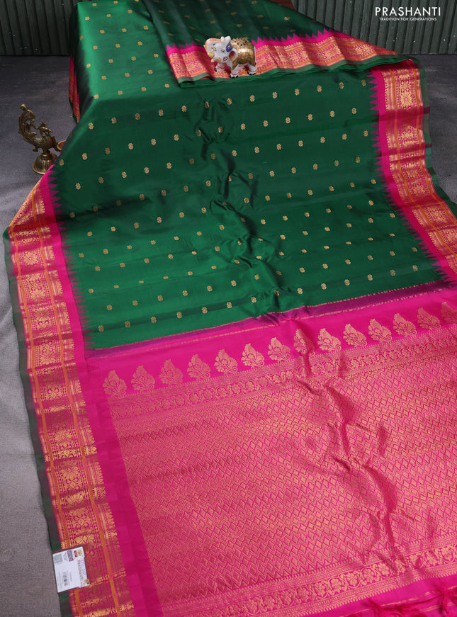 Pure gadwal silk saree green and pink with floral zari woven buttas and temple design zari woven border