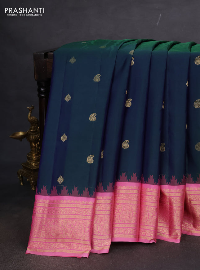 Pure gadwal silk saree dual shade of bluish green and light pink with paisley zari woven buttas and temple design zari woven border