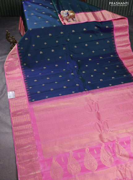 Pure gadwal silk saree dual shade of bluish green and light pink with paisley zari woven buttas and temple design zari woven border
