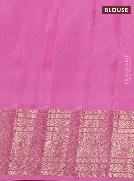 Pure gadwal silk saree dual shade of bluish green and light pink with paisley zari woven buttas and temple design zari woven border