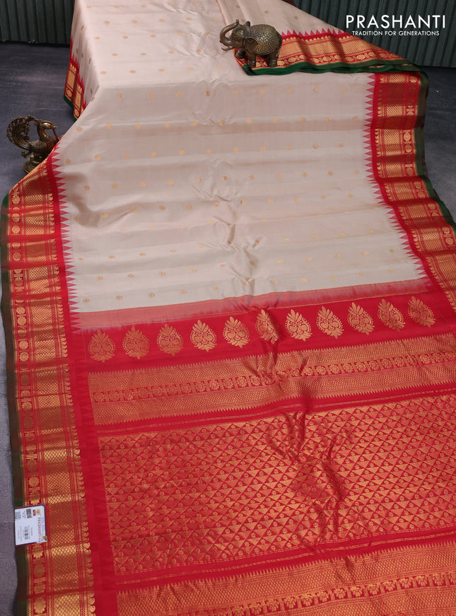 Pure gadwal silk saree cream and red with zari woven buttas and temple design zari woven border