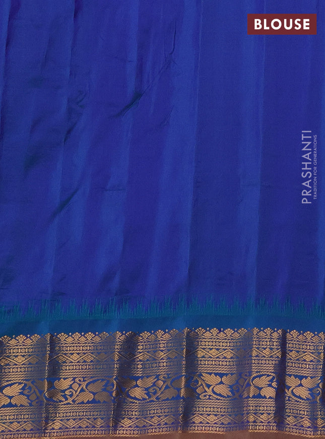 Pure gadwal silk saree cream and dual shade of blue with allover zari checks & buttas and temple design zari woven korvai border