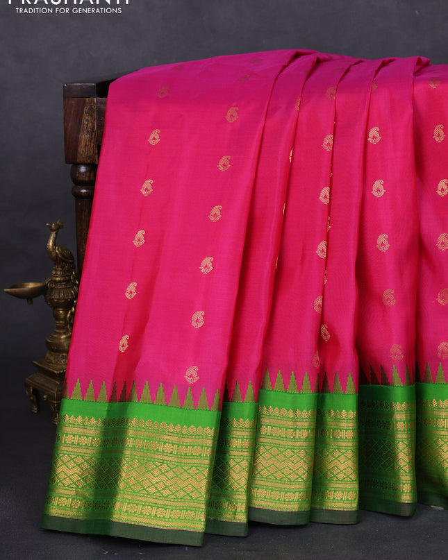 Pure gadwal silk saree pink and green with paisley zari woven buttas and temple design zari woven border