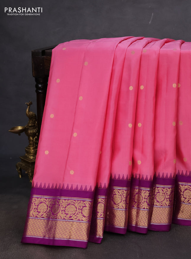 Pure gadwal silk saree peach pink and purple with zari woven buttas and temple design zari woven border