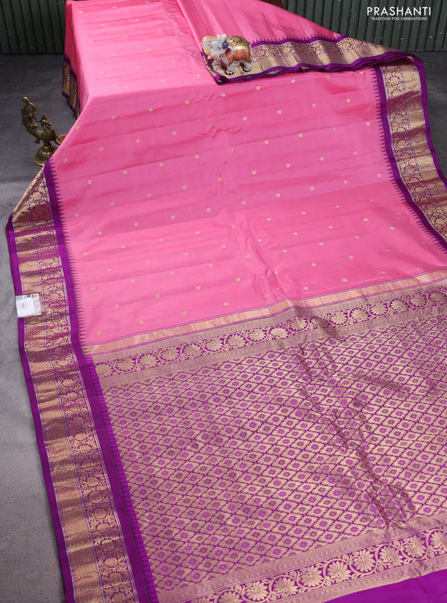 Pure gadwal silk saree peach pink and purple with zari woven buttas and temple design zari woven border