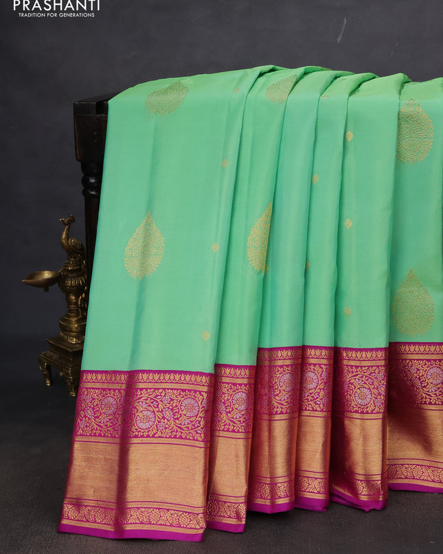 Pure gadwal silk saree teal green shade and purple with zari woven buttas and rich zari woven korvai border