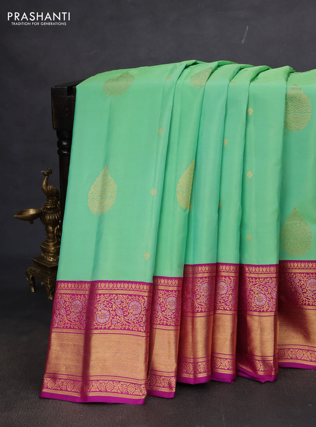 Pure gadwal silk saree teal green shade and purple with zari woven buttas and rich zari woven korvai border