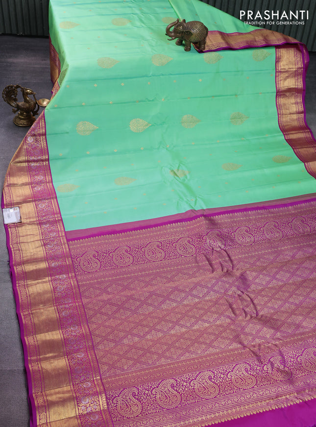 Pure gadwal silk saree teal green shade and purple with zari woven buttas and rich zari woven korvai border