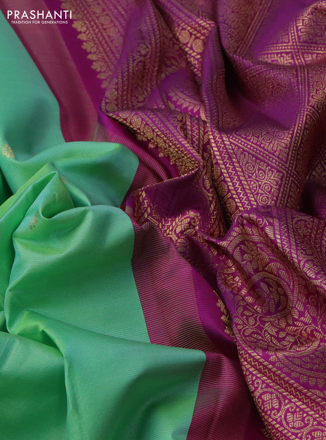 Pure gadwal silk saree teal green shade and purple with zari woven buttas and rich zari woven korvai border