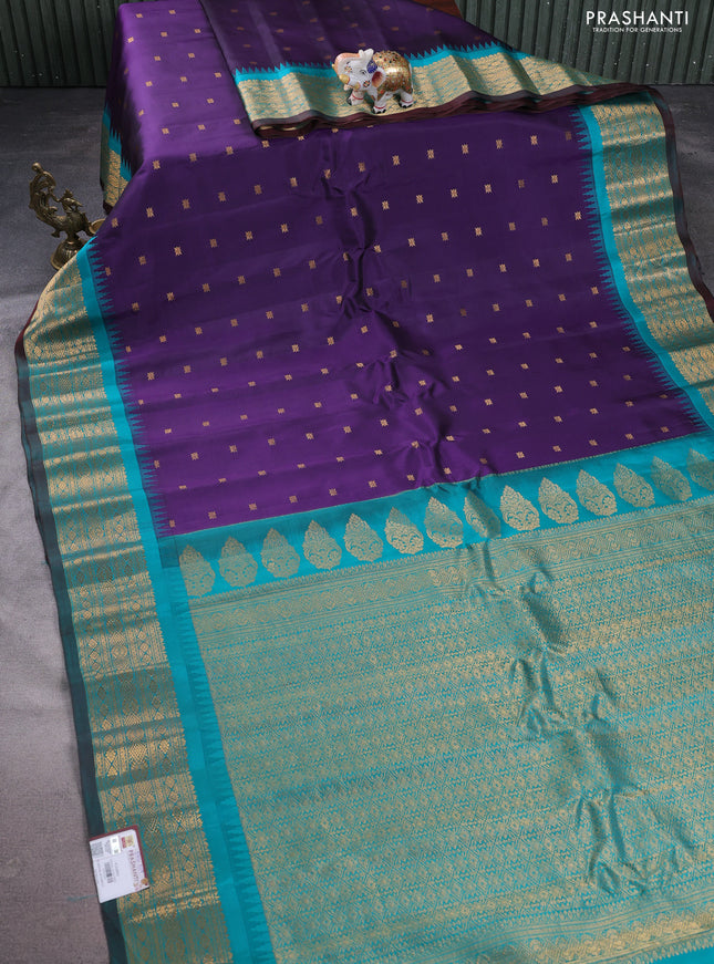 Pure gadwal silk saree violet and teal green with zari woven buttas and temple design zari woven border