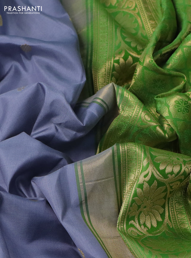 Pure gadwal silk saree grey and light green with zari woven buttas and temple design zari woven korvai border