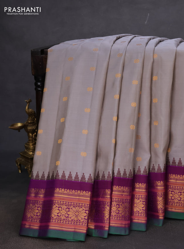 Pure gadwal silk saree grey and purple with zari woven floral buttas and temple design zari woven border