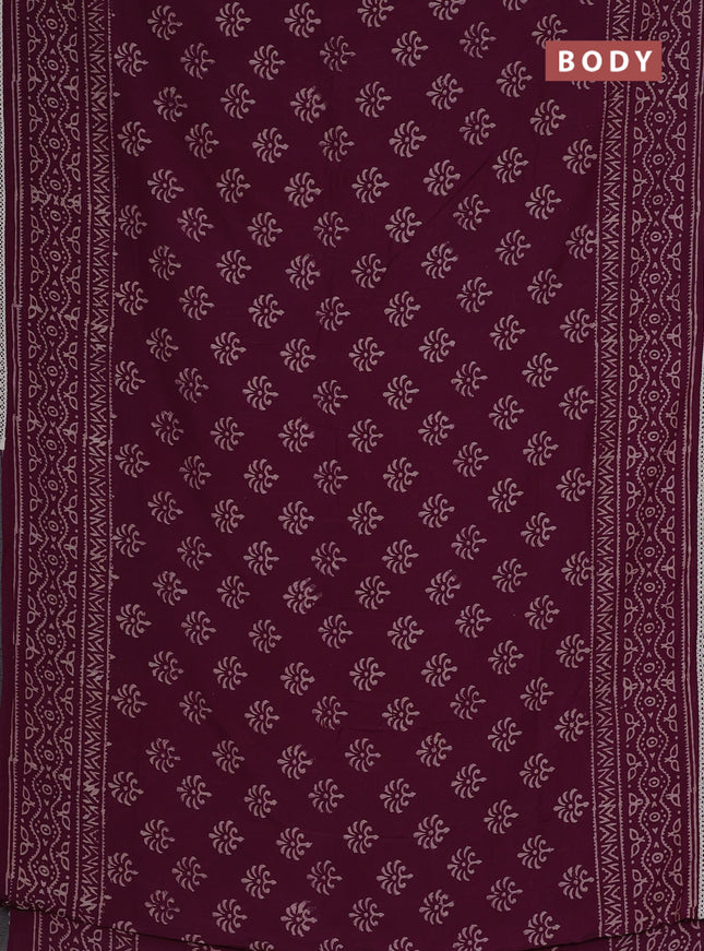 Semi pashmina silk saree wine shade and cream with allover butta prints and crocia lace work border