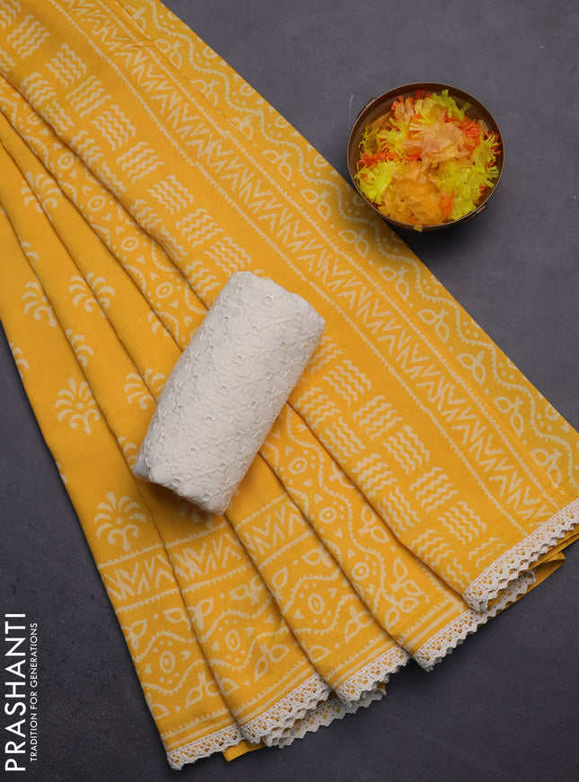 Semi pashmina silk saree yellow and cream with allover butta prints and crocia lace work border