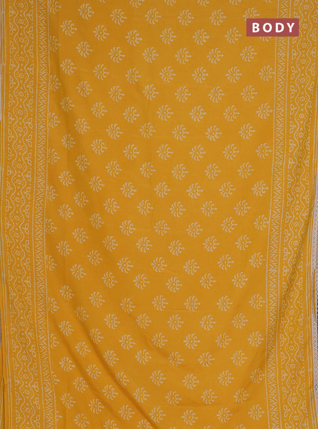 Semi pashmina silk saree yellow and cream with allover butta prints and crocia lace work border