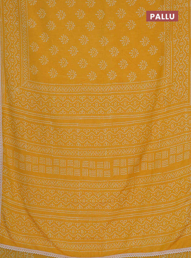 Semi pashmina silk saree yellow and cream with allover butta prints and crocia lace work border