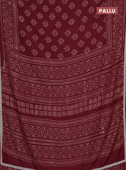 Semi pashmina silk saree maroon and cream with allover butta prints and crocia lace work border