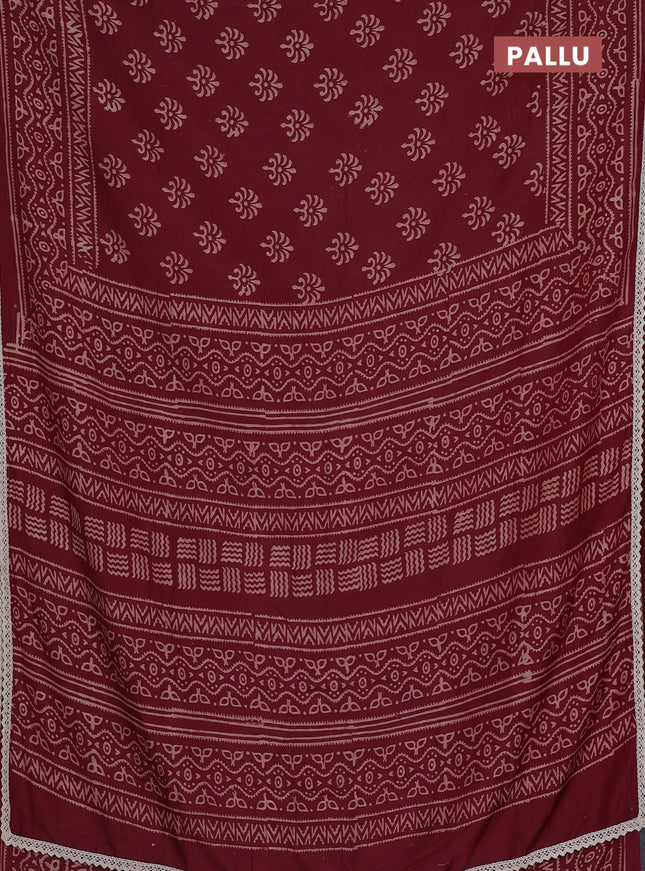 Semi pashmina silk saree maroon and cream with allover butta prints and crocia lace work border