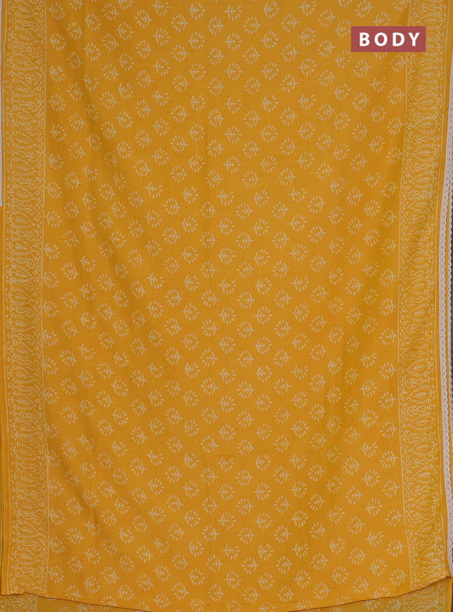 Semi pashmina silk saree yellow and cream with allover butta prints and crocia lace work border