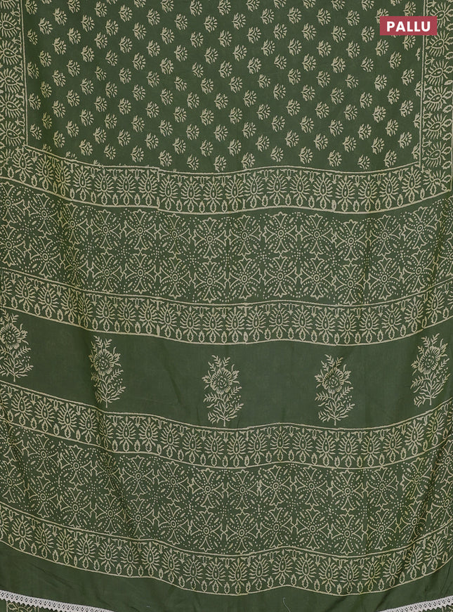 Semi pashmina silk saree sap green and cream with allover butta prints and crocia lace work border
