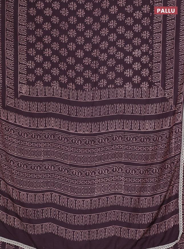 Semi pashmina silk saree wine shade and cream with allover butta prints and crocia lace work border