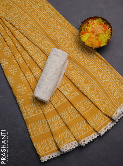 Semi pashmina silk saree yellow and cream with allover butta prints and crocia lace work border
