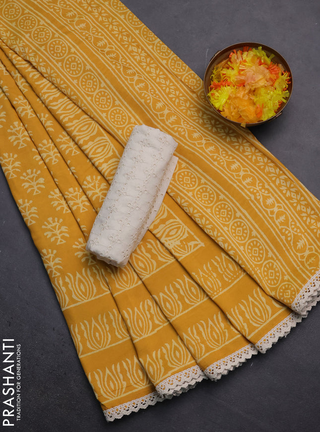 Semi pashmina silk saree yellow and cream with allover butta prints and crocia lace work border