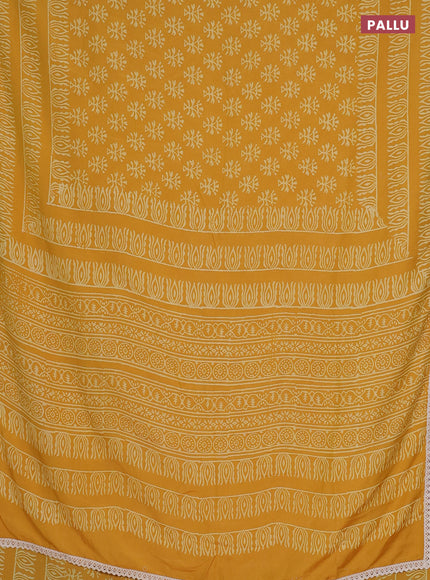 Semi pashmina silk saree yellow and cream with allover butta prints and crocia lace work border