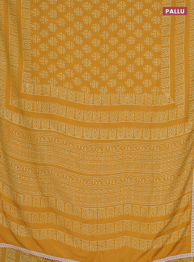 Semi pashmina silk saree yellow and cream with allover butta prints and crocia lace work border
