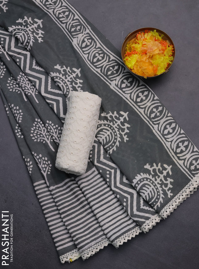 Semi pashmina silk saree grey and cream with allover tree butta prints and crocia lace work border