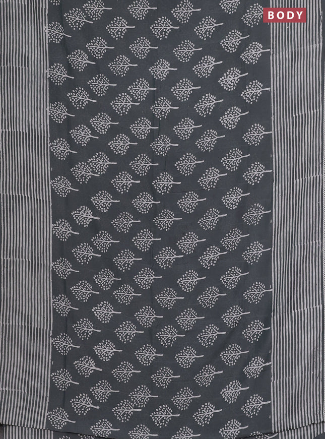 Semi pashmina silk saree grey and cream with allover tree butta prints and crocia lace work border