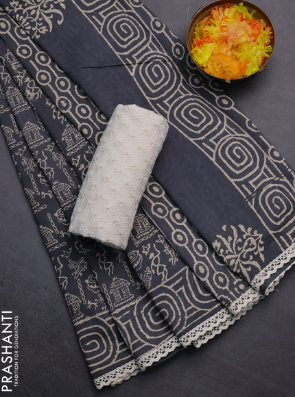 Semi pashmina silk saree grey and cream with allover warli prints and crocia lace work border
