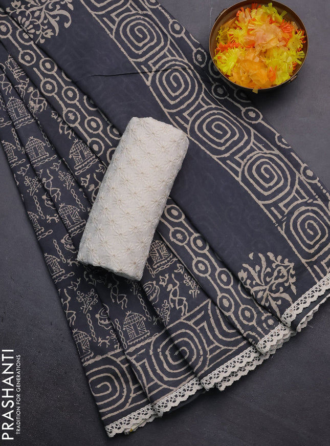Semi pashmina silk saree grey and cream with allover warli prints and crocia lace work border