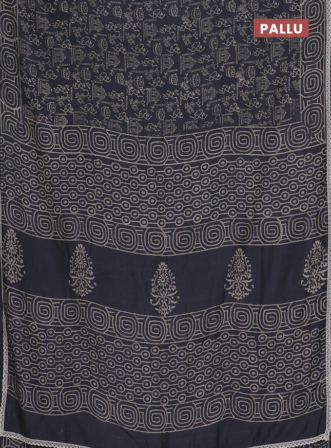 Semi pashmina silk saree grey and cream with allover warli prints and crocia lace work border