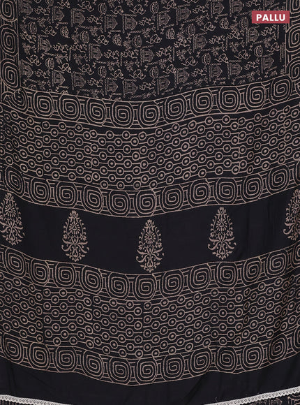 Semi pashmina silk saree black and cream with allover warli prints and crocia lace work border