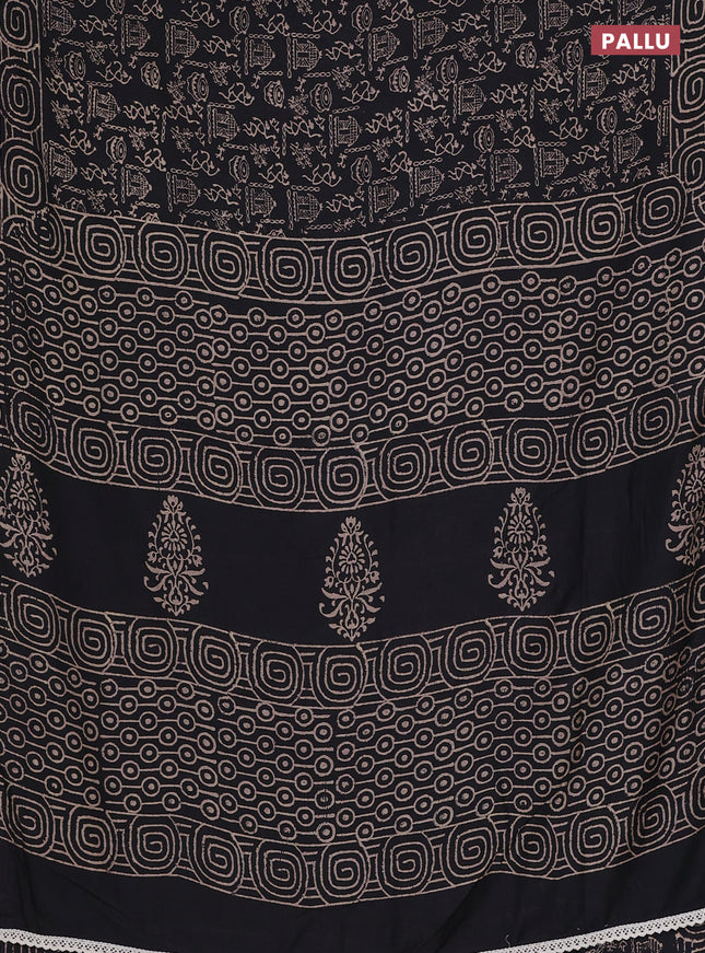 Semi pashmina silk saree black and cream with allover warli prints and crocia lace work border