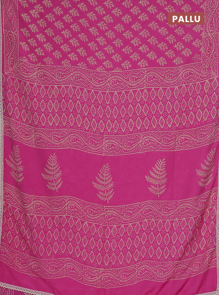Semi pashmina silk saree pink and cream with allover butta prints and crocia lace work border