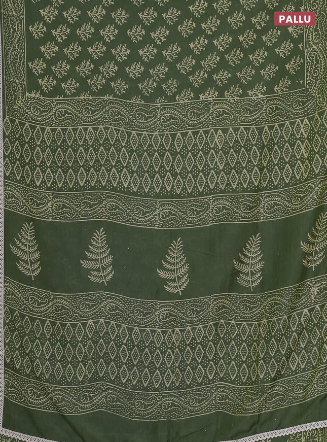 Semi pashmina silk saree green and cream with allover butta prints and crocia lace work border